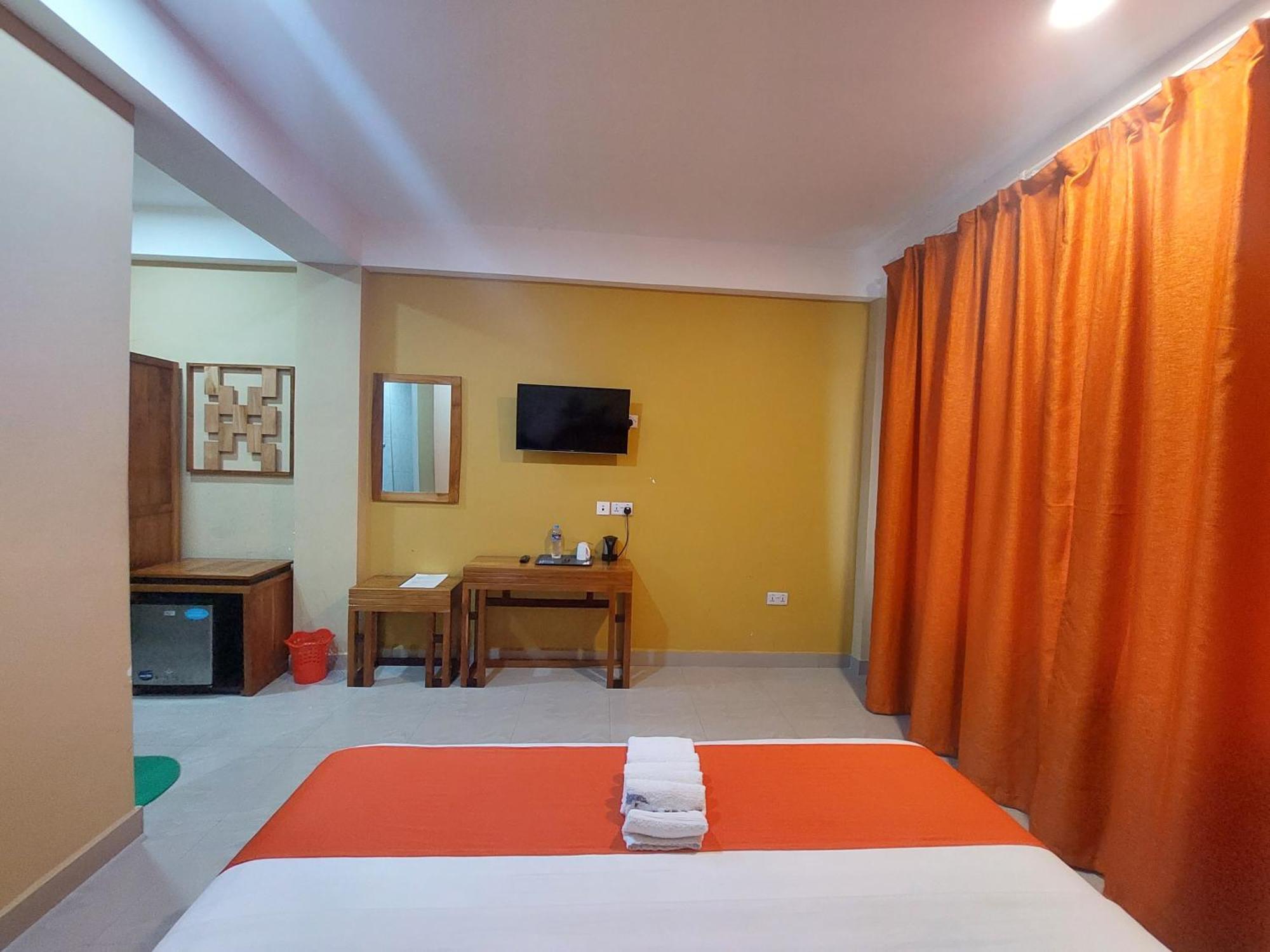 Dolphin Hotel Танга Экстерьер фото